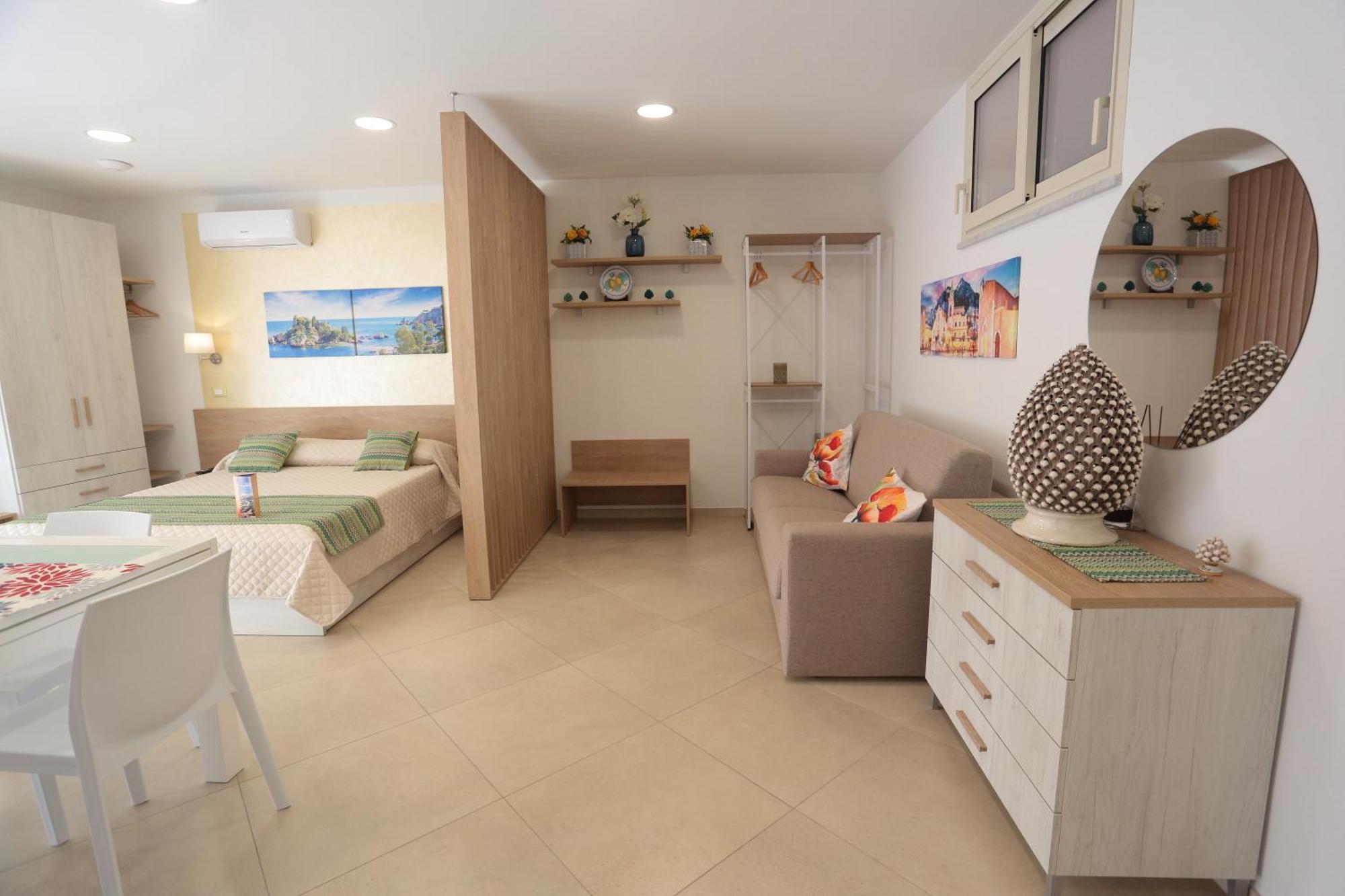 גיארדיני נאקסוס Theos Holidays Apartments מראה חיצוני תמונה