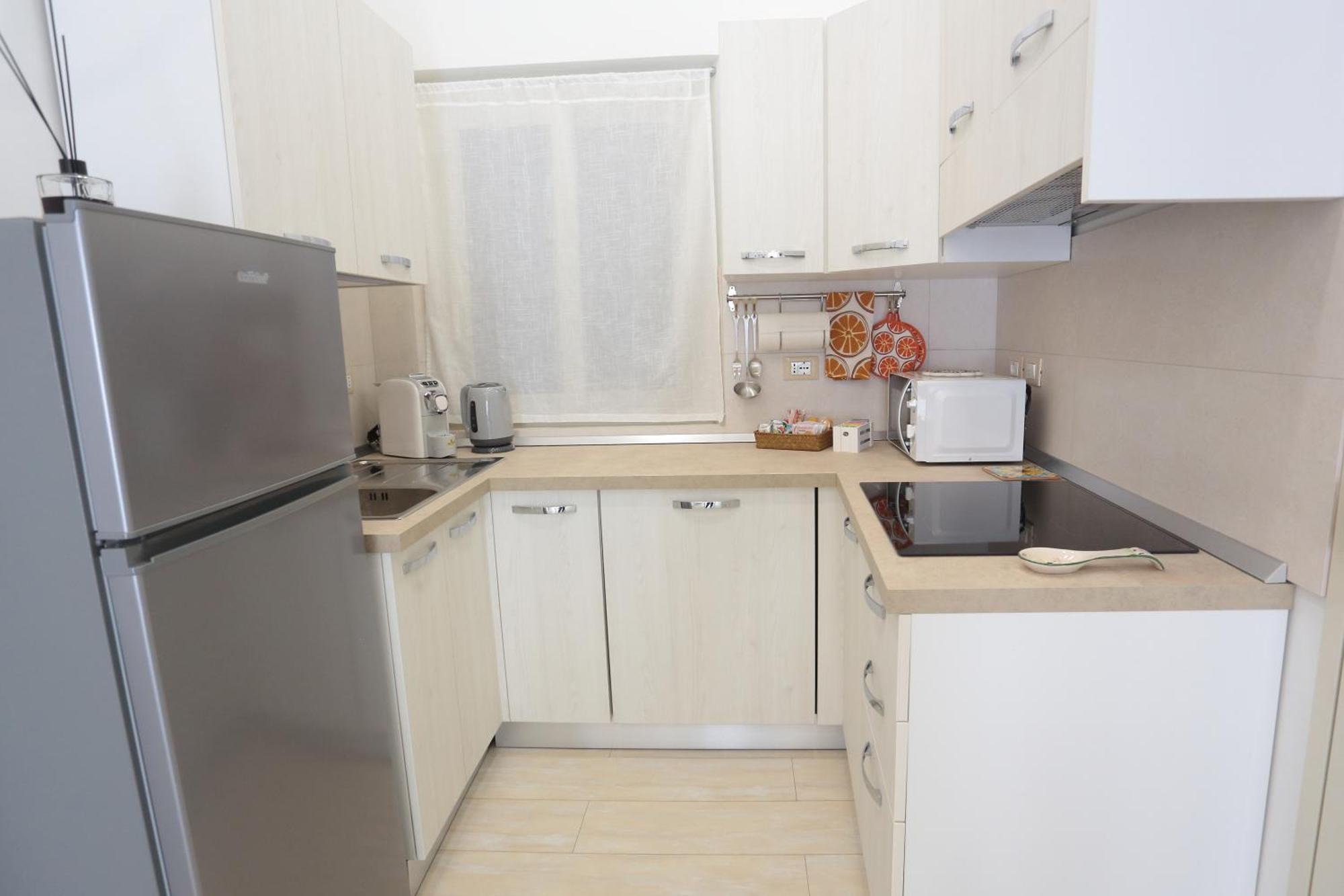 גיארדיני נאקסוס Theos Holidays Apartments מראה חיצוני תמונה